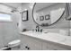 Clean bathroom, white vanity, walk-in shower, and modern decor at 821 Evergreen Way, Longboat Key, FL 34228