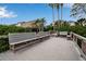 Spacious community deck with benches at 821 Evergreen Way, Longboat Key, FL 34228