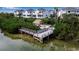 Private waterfront dock with seating area at 821 Evergreen Way, Longboat Key, FL 34228