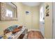 Bright entryway with a console table and a seashell mirror at 821 Evergreen Way, Longboat Key, FL 34228