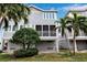 Two-story home with screened porch and backyard at 821 Evergreen Way, Longboat Key, FL 34228