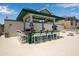 Relaxing pool bar with a TV at 821 Evergreen Way, Longboat Key, FL 34228