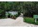 Well-maintained walking path leading to the fishing dock at 821 Evergreen Way, Longboat Key, FL 34228