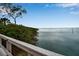 Scenic waterfront view from a wooden walkway at 821 Evergreen Way, Longboat Key, FL 34228