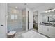 Spa-like bathroom with walk-in shower and large vanity at 8612 Sundance Loop, Sarasota, FL 34238