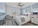 Charming bedroom with crib and double bed at 8612 Sundance Loop, Sarasota, FL 34238