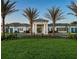 Community clubhouse with classic architecture and landscaping at 8612 Sundance Loop, Sarasota, FL 34238