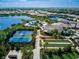 Community overview showcasing various amenities including pools and tennis courts at 8612 Sundance Loop, Sarasota, FL 34238