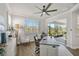 Home office with backyard views and built-in desk at 8612 Sundance Loop, Sarasota, FL 34238
