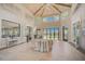 Bright and spacious clubhouse lobby with high ceilings and elegant decor at 8612 Sundance Loop, Sarasota, FL 34238