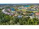 Aerial view of community with golf course and lake at 917 S Doral Ln, Venice, FL 34293