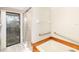 Bathroom with shower and bathtub, grab bars, and sliding glass door at 917 S Doral Ln, Venice, FL 34293