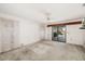 Primary bedroom with sliding glass doors leading to patio at 917 S Doral Ln, Venice, FL 34293