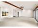 Spacious living room featuring high ceilings and a large window at 917 S Doral Ln, Venice, FL 34293