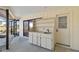Outdoor kitchen with sink and cabinets at 917 S Doral Ln, Venice, FL 34293