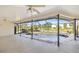 Enclosed pool and spa area with view of golf course at 917 S Doral Ln, Venice, FL 34293