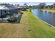 Property with canal-front lot and lush landscape at 917 S Doral Ln, Venice, FL 34293
