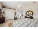 Serene bedroom with a queen-size bed and built-in closet at 958 Chickadee Dr, Venice, FL 34285