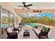 Relaxing screened-in pool area with seating and outdoor dining at 958 Chickadee Dr, Venice, FL 34285