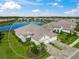 Aerial view of single Gathering home with lake view at 10024 Lake Wales Cir, Sarasota, FL 34241