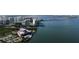 Aerial view of waterfront property, showcasing city skyline and marina at 11 Sunset Dr # 406, Sarasota, FL 34236