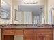 Updated bathroom featuring granite countertop and mosaic tile at 11 Sunset Dr # 406, Sarasota, FL 34236