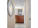 Bathroom with wood vanity and granite countertop at 11 Sunset Dr # 406, Sarasota, FL 34236
