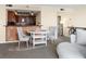 Eat-in kitchen with a breakfast bar and modern appliances at 11 Sunset Dr # 406, Sarasota, FL 34236