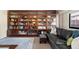 Spacious library with built-in shelving and comfortable seating at 11 Sunset Dr # 406, Sarasota, FL 34236