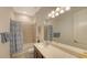 Bathroom with tub shower combo and updated vanity at 12607 Wheatgrass Ct, Parrish, FL 34219