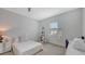 Guest bedroom with window and built-in workspace at 12607 Wheatgrass Ct, Parrish, FL 34219