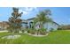 Charming house exterior with lush landscaping at 12607 Wheatgrass Ct, Parrish, FL 34219