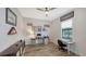 Home office with ample desk space and large window at 12607 Wheatgrass Ct, Parrish, FL 34219