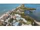 Aerial view of coastal homes, beach, and waterfront with stunning ocean views at 140 N Casey Key Rd, Osprey, FL 34229