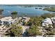 Waterfront property with lush landscaping and private dock access, offering serene coastal living with scenic views at 140 N Casey Key Rd, Osprey, FL 34229