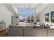 Large and airy living room with high ceilings and a beautiful outdoor view at 140 N Casey Key Rd, Osprey, FL 34229