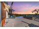 Deck showcasing outdoor seating and a pool with relaxing water views at 140 N Casey Key Rd, Osprey, FL 34229