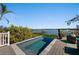 Inviting plunge pool on the deck with a stunning view of the water at 140 N Casey Key Rd, Osprey, FL 34229