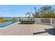 Relaxing pool deck with lounge seating and amazing water views, perfect for enjoying the coastal breeze at 140 N Casey Key Rd, Osprey, FL 34229