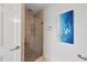 Modern glass-enclosed shower with tile surround and elegant fixtures at 140 N Casey Key Rd, Osprey, FL 34229