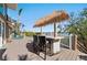 Outdoor tiki bar perfect for entertaining with great views at 140 N Casey Key Rd, Osprey, FL 34229