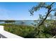 Scenic water view from the property featuring a private dock at 140 N Casey Key Rd, Osprey, FL 34229