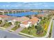 Aerial view of community, showcasing lakefront property and neighborhood at 14608 Derna Ter, Bradenton, FL 34211