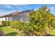 Private backyard oasis with lush landscaping and screened enclosure at 14608 Derna Ter, Bradenton, FL 34211
