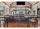 Elegant clubhouse bar with high-top seating and scenic views at 14608 Derna Ter, Bradenton, FL 34211