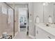 Bathroom with walk-in shower and access to the bedroom at 14608 Derna Ter, Bradenton, FL 34211