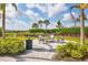 Community fire pit with seating for relaxing evenings at 14608 Derna Ter, Bradenton, FL 34211