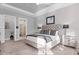 Bright main bedroom with ensuite bathroom access at 14608 Derna Ter, Bradenton, FL 34211