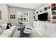 Spacious office with built-in shelving and a comfortable sofa at 14608 Derna Ter, Bradenton, FL 34211