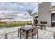 Covered patio with seating and a fireplace at 14608 Derna Ter, Bradenton, FL 34211